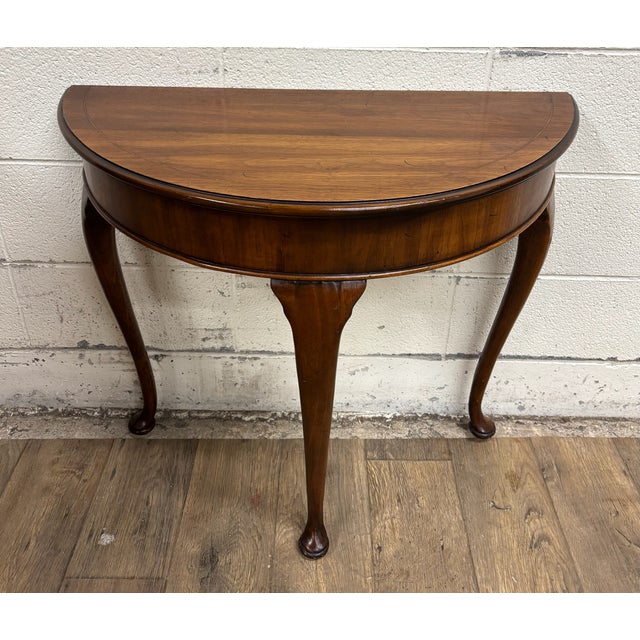 This is a gorgeous vintage Queen Anne style half moon demilune entry hall table or console. Solid and sturdy, with minor...