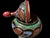 A vintage Turkish copper covered urn with a rounded pedestal form, tall finial lid, and hand-painted decoration...