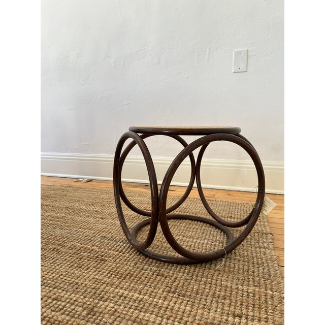 Vintage bentwood table/stool in the style of Thonet with dark stain finish and natural caning at top - versatile in its...