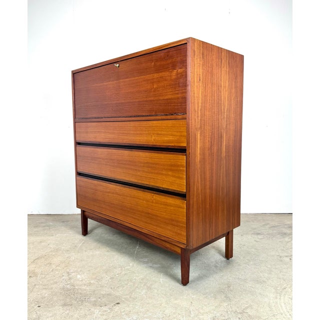 A rare walnut, ebonized wood and cane dresser designed by Kipp Stewart for Calvin Furniture (unsigned) circa 1960’s. Newly...