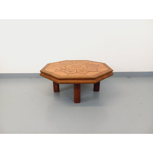 Vintage Barrois octagonal coffee table from the 1960s/70s, with four oak legs and frame, and an octagonal Vallauris...