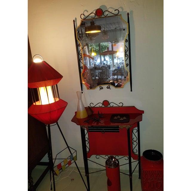 The small console table is equipped with a drawer. The ensemble can be used as a dressing table as well as a small...