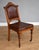 For sale is a set of 6 Victorian oak dining chairs, upholstered in leather, raised on turned legs terminating on castors....
