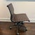 Herman Miller Eames Aluminum Group Management Chair EA335 The aluminum frame, covered by a supple brown leather, creates a...