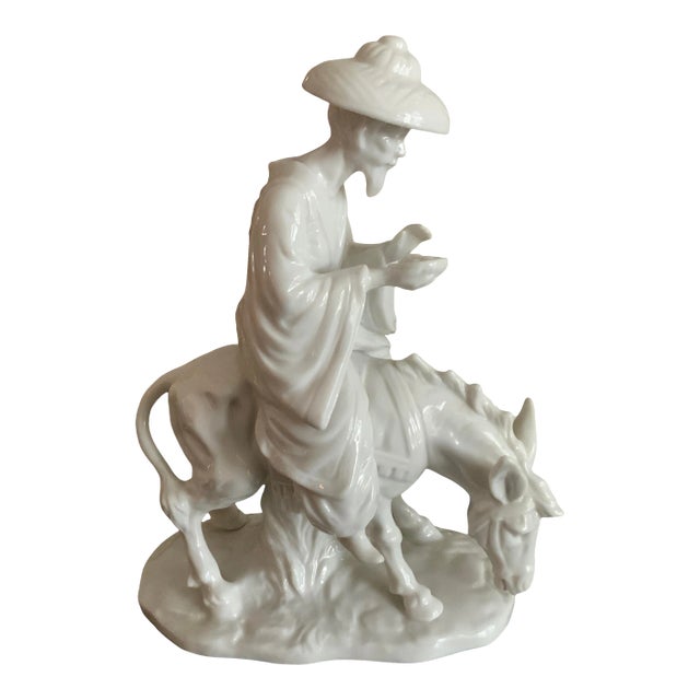 White Porcelain Japanese Man Riding a Donkey Figurine For Sale