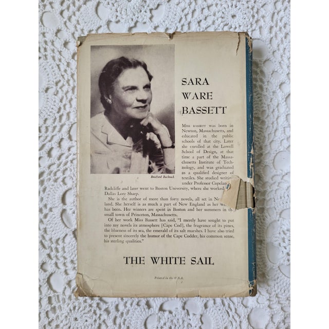 The White Sail by Sara Ware Bassett, copyright 1949. This book would look lovely styled in a coastal home. It measures 8...