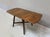 A beautiful example of the Ercol Old Colonial 377 drop leaf dining table in solid elm, dating from the 1950s and bearing...