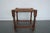 A charming antique stool featuring barley twist legs and a handwoven rush seat, crafted in the early 20th century. This...