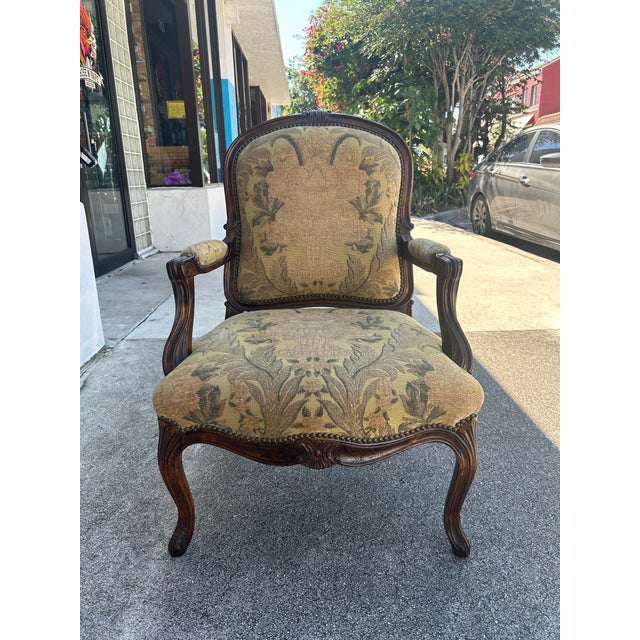 Impressive pair of 19 century French armchairs handcrafted in Walnut with tapestry style, upholstery on cabriole legs.