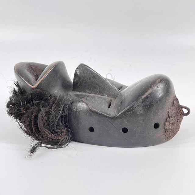 This African mask comes from Liberia and CÃ´te d'Ivoire by the Dan people. This mask retains all the qualities of a...