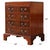 A Small Mahogany Campaign Chest by Niagara Furniture in an English style. This Small Mahogany Campaign Chest works very...