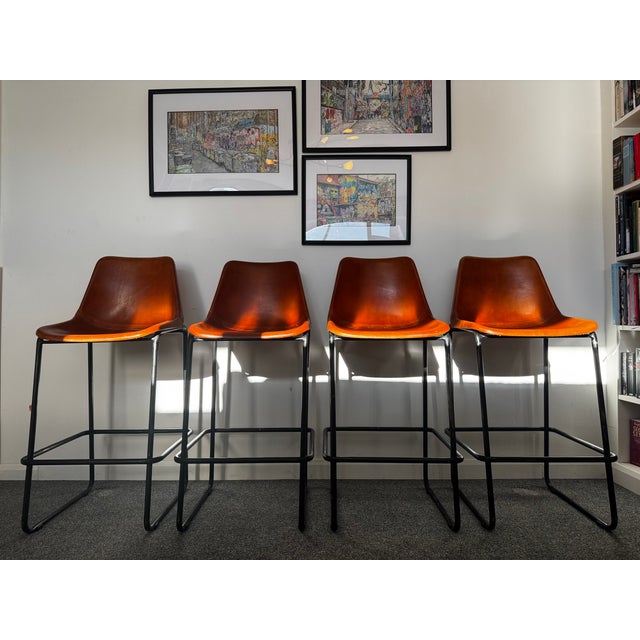 These are not reproductions. They are original vintage industrial bar stools — the kind that quietly inspired the wave of...