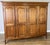 Vintage French Louis XVI Style Carved Oak 4-Door Wardrobe For Sale - Image 4 of 12