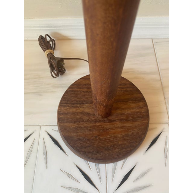 Vintage Midcentury Teak Floor Lamp- classic, solid, and stylish. Round base and rounded wood straight up and down make up...