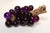 Vintage Mid-Century American Modern grape cluster centerpiece/decorative object (ca. 1960s). Composed of translucent...