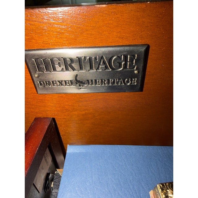 This gorgeous piece of furniture is vintage and made by Drexel. Solid and well made, this will be a keepsake for many...