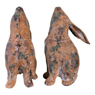 Pair of Weathered Cast Iron Rabbit Garden Sculptures With Verdigris Patina For Sale