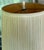 Vintage table lamp with matching shade and finial. Lamp is made of ceramic, cluster of faux bamboo with green leaves....