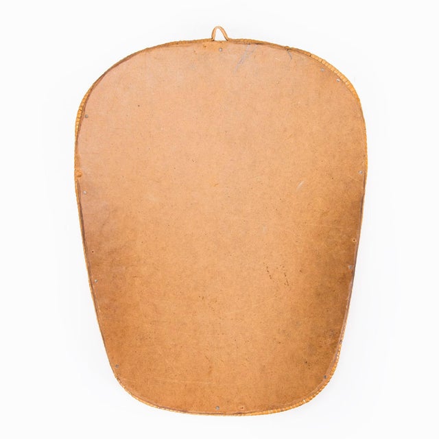 Mirror oval in rattan frame made in France around 1950. Good vintage condition.