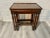 Carved wood design on large table apron, classical fluted legs, mahogany framed glass tops. Mahogany throughout. Excerpt...