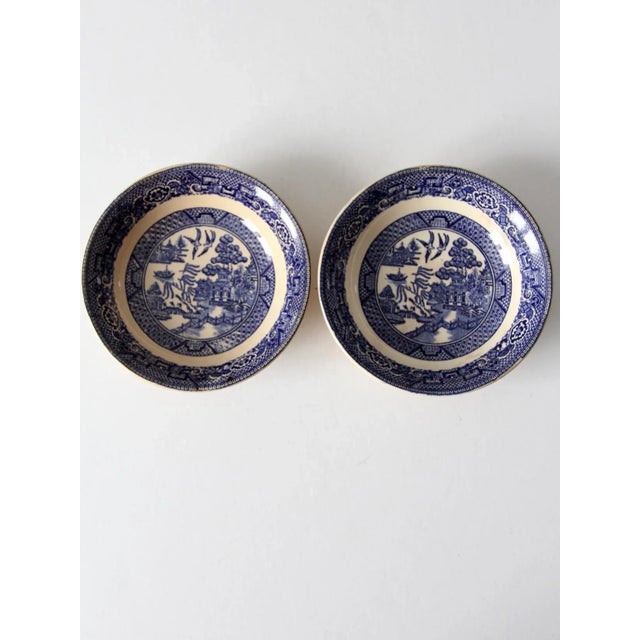 A pair of vintage Blue Willow Ware bowls by Homer Laughlin China Company, circa 1941. Each dish features the classic blue...