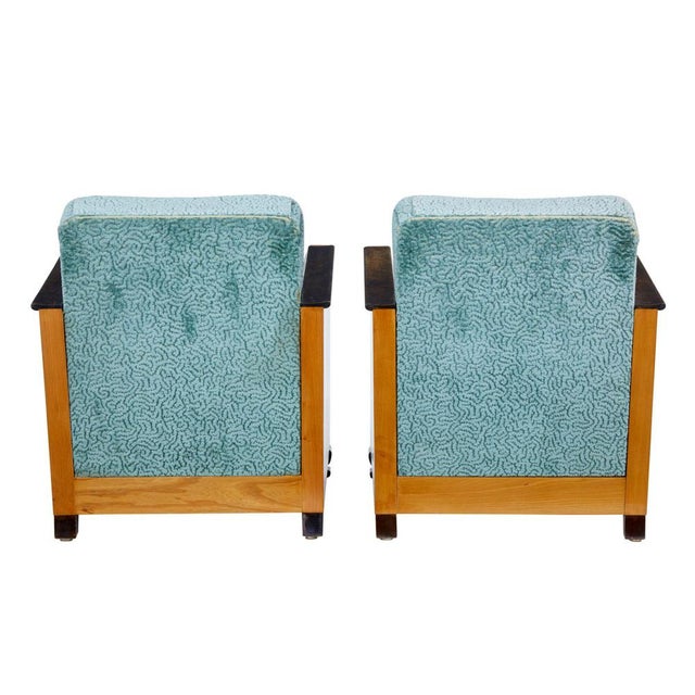 Fine pair of swedish elm and birch armchairs circa 1930. Elegant pair of art deco chairs, featuring beautiful elm sides...