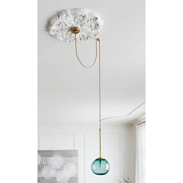 Pendant ball cable 20 by contain dimensions: ø 20 x h 100 cm (custom length). Materials: brass cable, 3d printed pla...