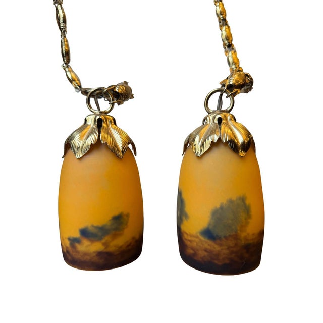 Signed French Art Deco pendant lights by Degué (David Guéron), France, circa 1920s–1930s. Featuring original acid-etched...