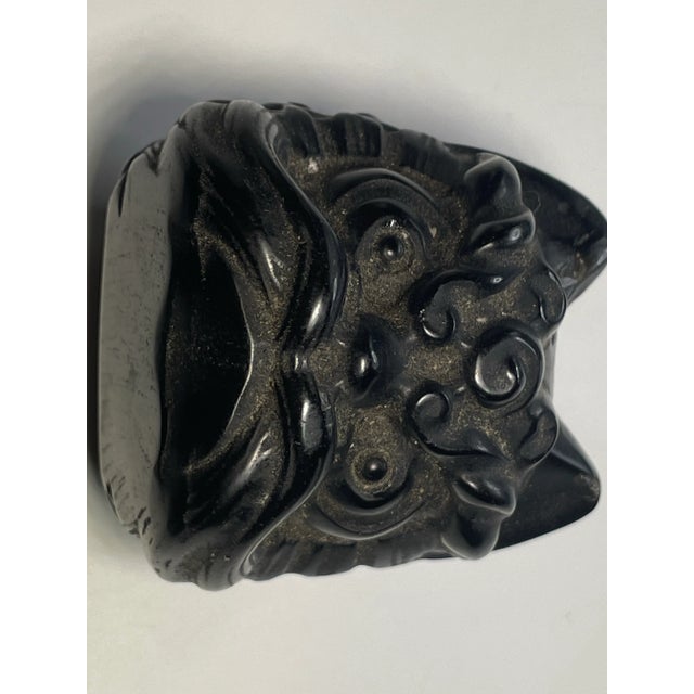 Masterful carving of mythological Foo Dog animal, originating from the late Edo period. The item is carved from black...