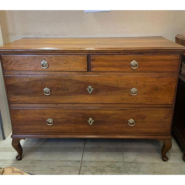A chest of drawers in the French Directoire style, a period between Neoclassicism and the Empire period, characterized by...