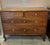 A chest of drawers in the French Directoire style, a period between Neoclassicism and the Empire period, characterized by...