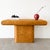 Vintage 1980s Postmodern bullnose console table featuring a warm caramel-toned veneer with richly figured movement...