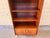 This beautiful vintage bookcase features a refined veneer finish, distinctive metal handles, and a sophisticated high-...