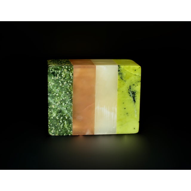 Behold the beauty and exquisite craftsmanship of objet d'art of a box crafted from natural gemstones, showcasing the...