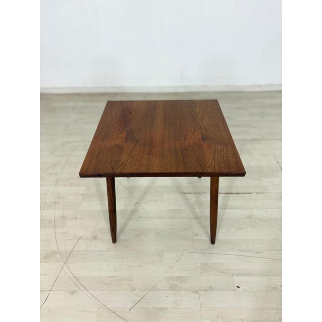 For sale is a stylish and minimalist side table in classic Scandinavian mid-century design from the 1960s. The square...