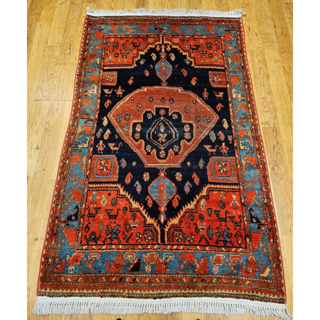 "This exceptional vintage Persian Malayer area rug from the early 1900s is a piece of unusual character and artistic...