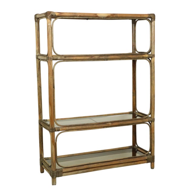 Vintage open shelving unit or bookcase, entirely in boho style, made of bamboo and rattan, with the original smoked glass...
