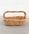 Crafted from natural twigs, this charming vintage basket exudes rustic, timeless appeal. Its oval silhouette and twisted...