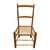Charming vintage rustic side chair featuring a simple handcrafted wood frame with a tall ladder back and a hand-woven cord...