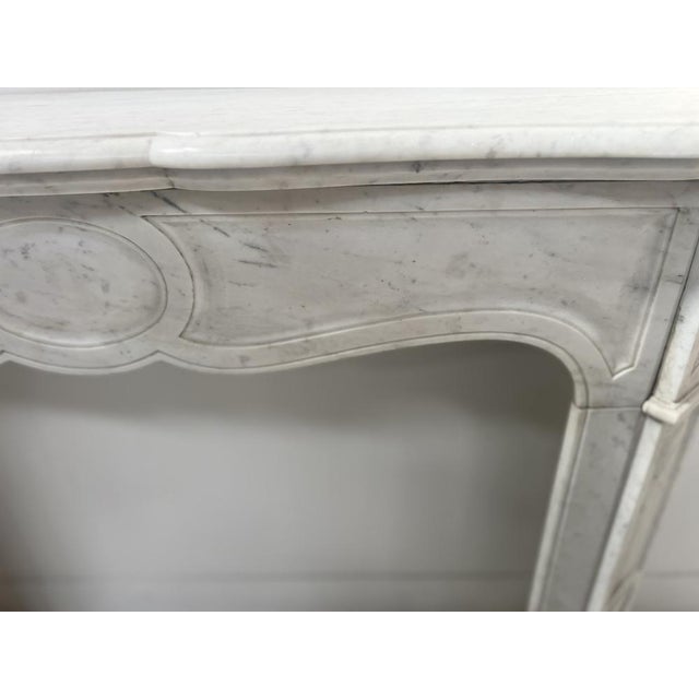 Pompadour-style fireplace in veined white marble fluted jambs and frieze good condition ready to be installed in your home...