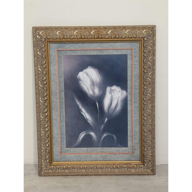 Ornate gold picture frame with rich ornamentation A decorative gold frame, distinguished by its wide profile and striking...