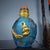 Add a touch of historical elegance to your collection with this exquisite antique snuff bottle. Crafted from blue glass,...