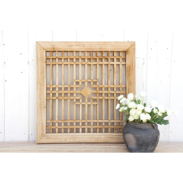 A traditional architectural feature of Chinese buildings, this beautiful antique Chinese lattice window was prominent in...