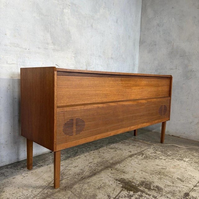A superb 1960s–1970s hmv teak radiogram, combining original british audio equipment with an exceptionally stylish piece of...