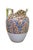 Antique porcelain pitcher featuring a stylized floral chintz pattern in blue / red / yellow enamels Dimensions: 7.5" x 6"...