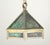 Arts & Crafts style pendant light featuring marbled green slag panels and brass framing. The chain is made of steel. This...