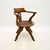A superb antique Victorian Gothic revival solid oak swivel desk chair, made in England and dating from around the...