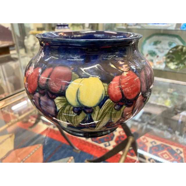 A William Moorcroft pottery bowl in the pomegranate pattern. England, circa 1930s.