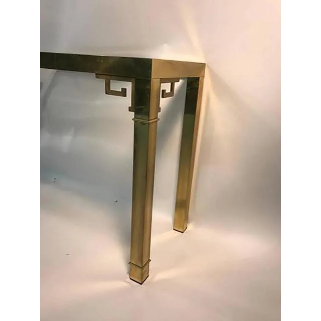 An elegant, Italian solid brass console table with Greek Key design, circa 1970. Good vintage condition.
