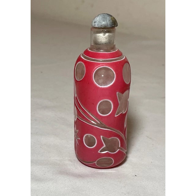Up for sale is a high quality antique hand carved Chinese cut to clear glass snuff bottle. The bottle is deeply carved out...